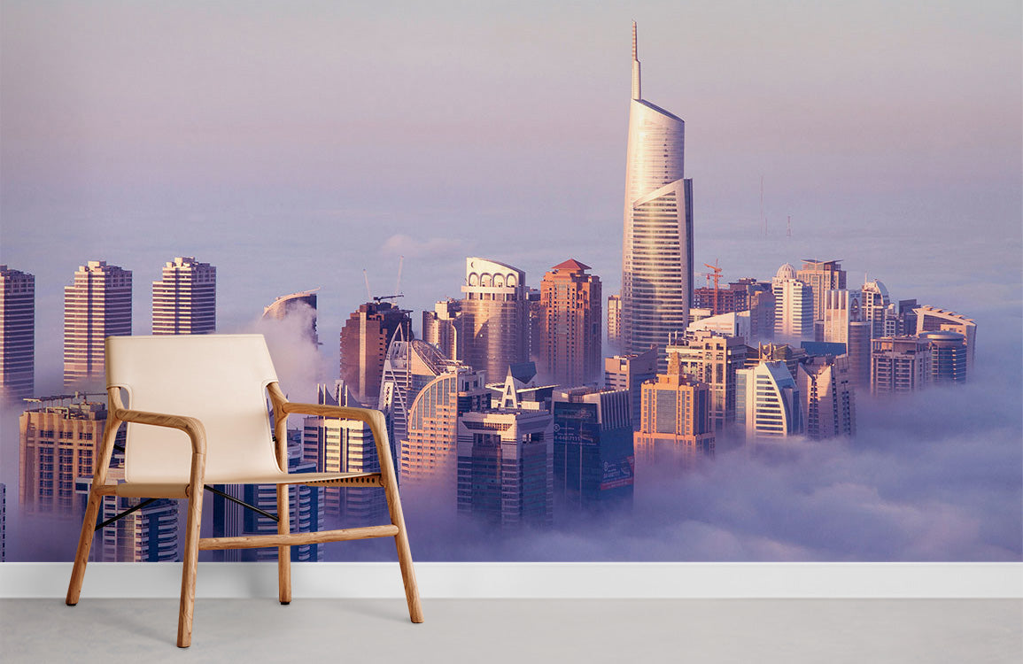 Urban Skyline Dreamscape mural in soft pastels, beige chair, grey flooring, serene misty cityscape decor.