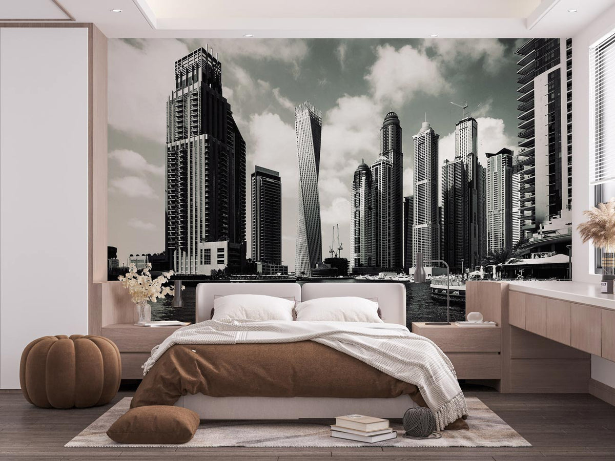 Modern bedroom with Monochrome Cityscape Skyline Wallpaper, neutral decor, wooden flooring, and brown accents.