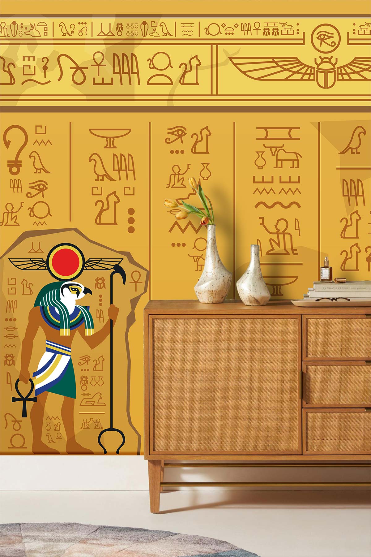 Ancient Egyptian Hieroglyphs mural wallpaper in warm sand tones, modern wooden sideboard, and beige rug.