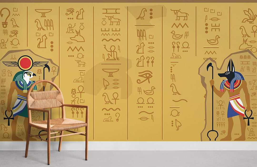 Ancient Egyptian hieroglyphs mural wallpaper in sand tones; featuring wooden chair; grey flooring.