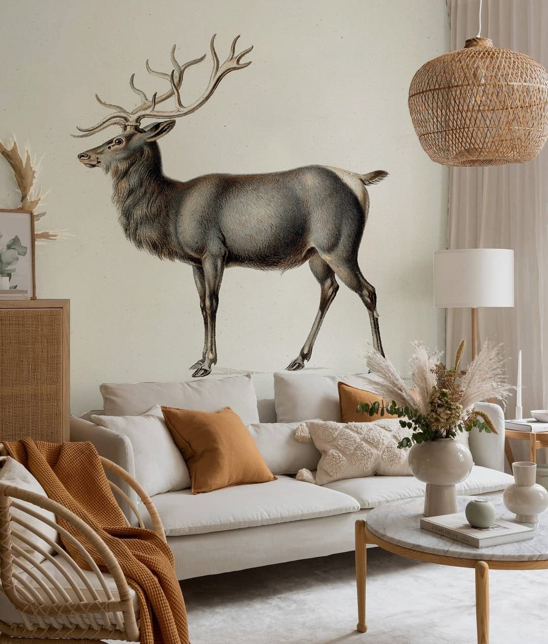 Vintage Antlered Stag Wallpaper in living room with white sofa, beige carpet, rattan pendant light.