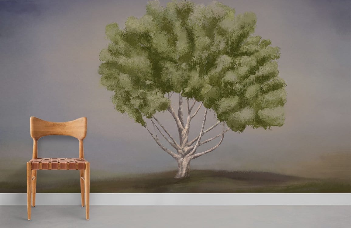 Lush Green Tranquil Tree Mural Wallpaper features wooden chair, neutral wall, and grey flooring.