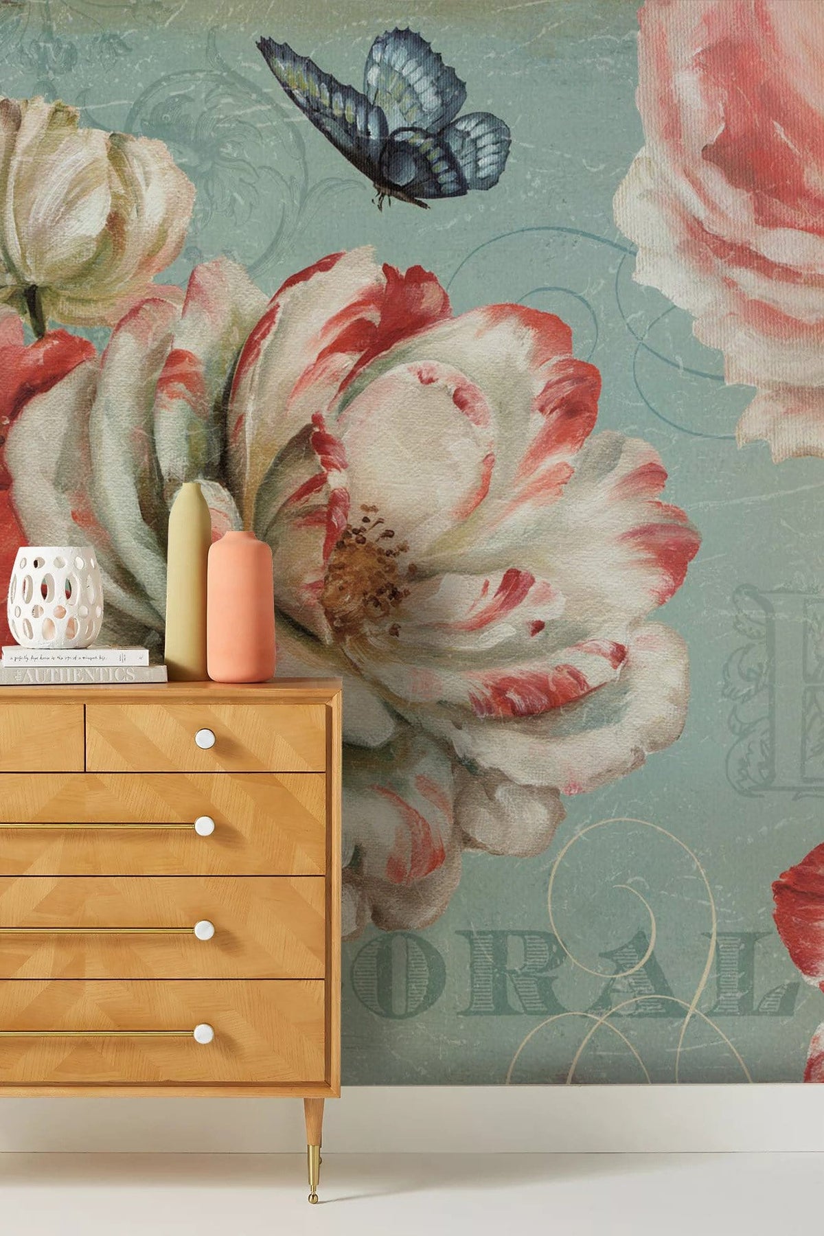 Vintage Floral Bloom Wallpaper with red roses, pastel canvas, wooden dresser, butterfly decor, blue wall.