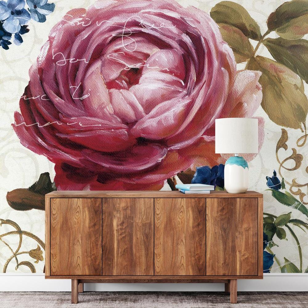 Elegant vintage floral mural in pink and blue tones behind wood cabinet, grey flooring, table lamp.