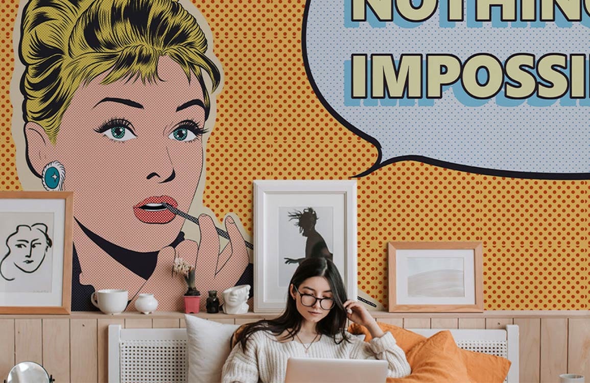 Retro Pop Art Mural Wallpaper, vibrant comic design, wooden panel wall, woman on modern sofa.