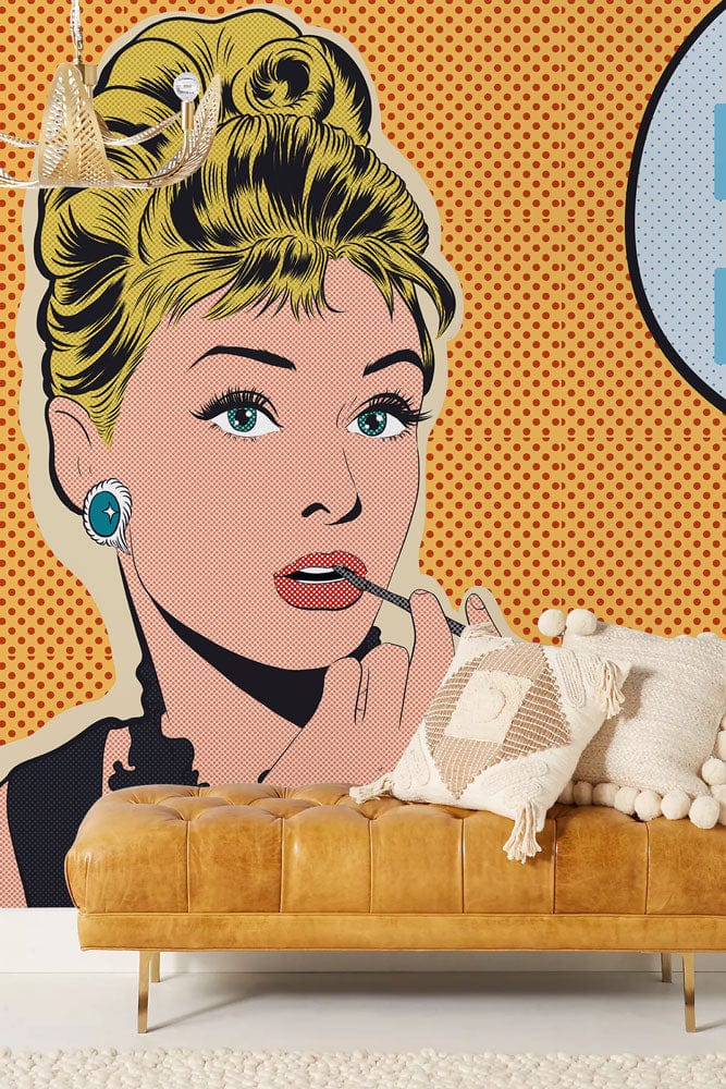Retro Pop Art Mural Wallpaper in vintage comic style, featuring a tan leather sofa and chandelier.