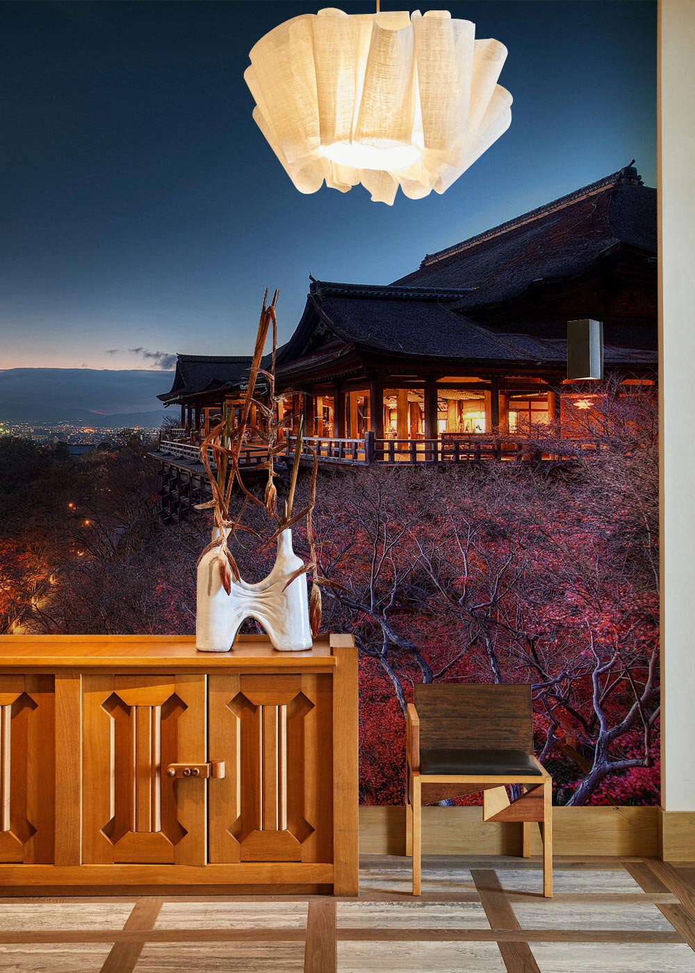 Tranquil Japanese Temple Nightscape Mural Wallpaper in living room with wooden sideboard and chair.