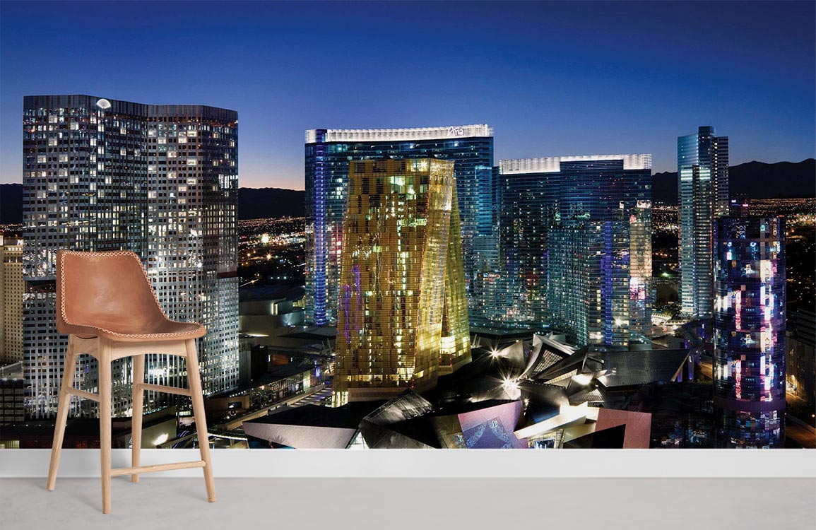 Vibrant night cityscape mural wallpaper, modern urban skyline, leather chair, white flooring, stylish interior.