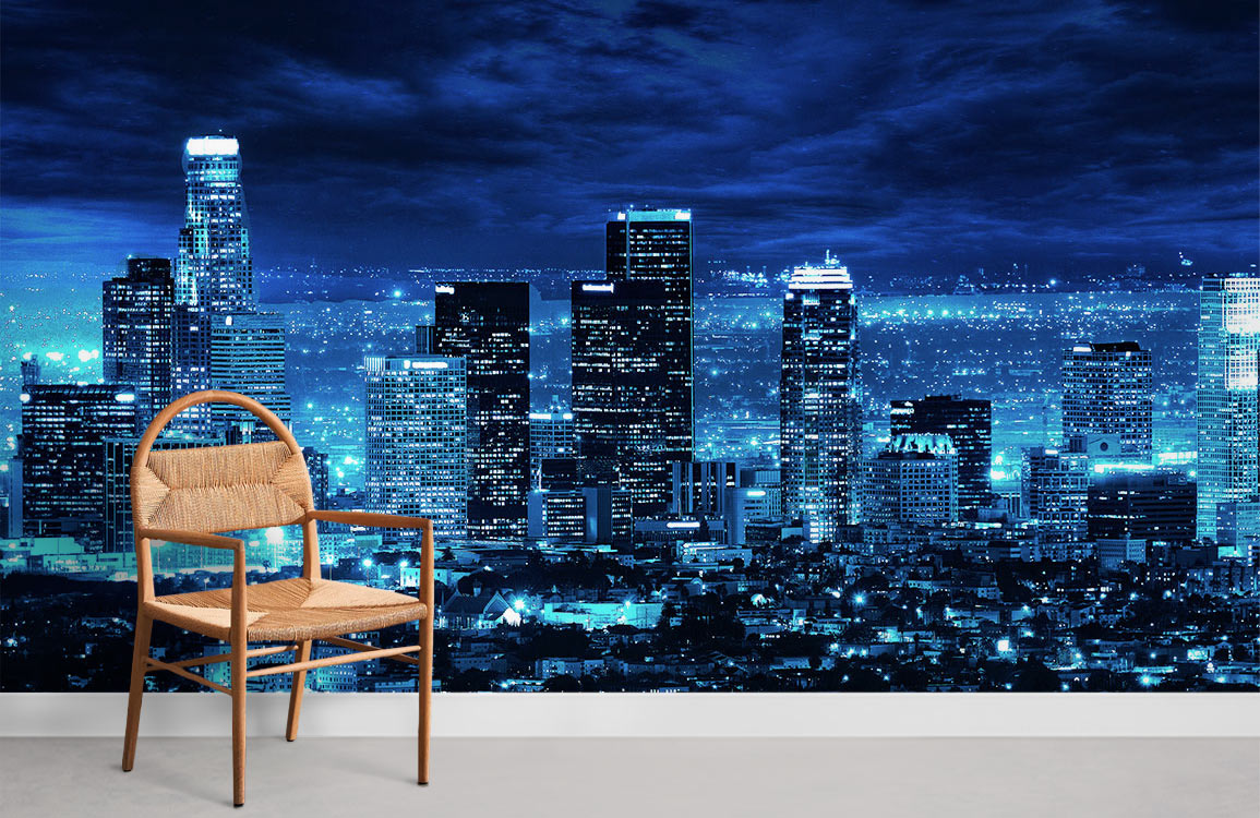 Urban Nightscape Mural Wallpaper, vibrant blue cityscape with wooden chair and grey flooring in room.
