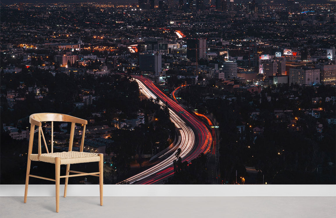 Vibrant Urban Nightscape Skyline Mural Wallpaper, chair, grey flooring, city lights panorama, contemporary decor.