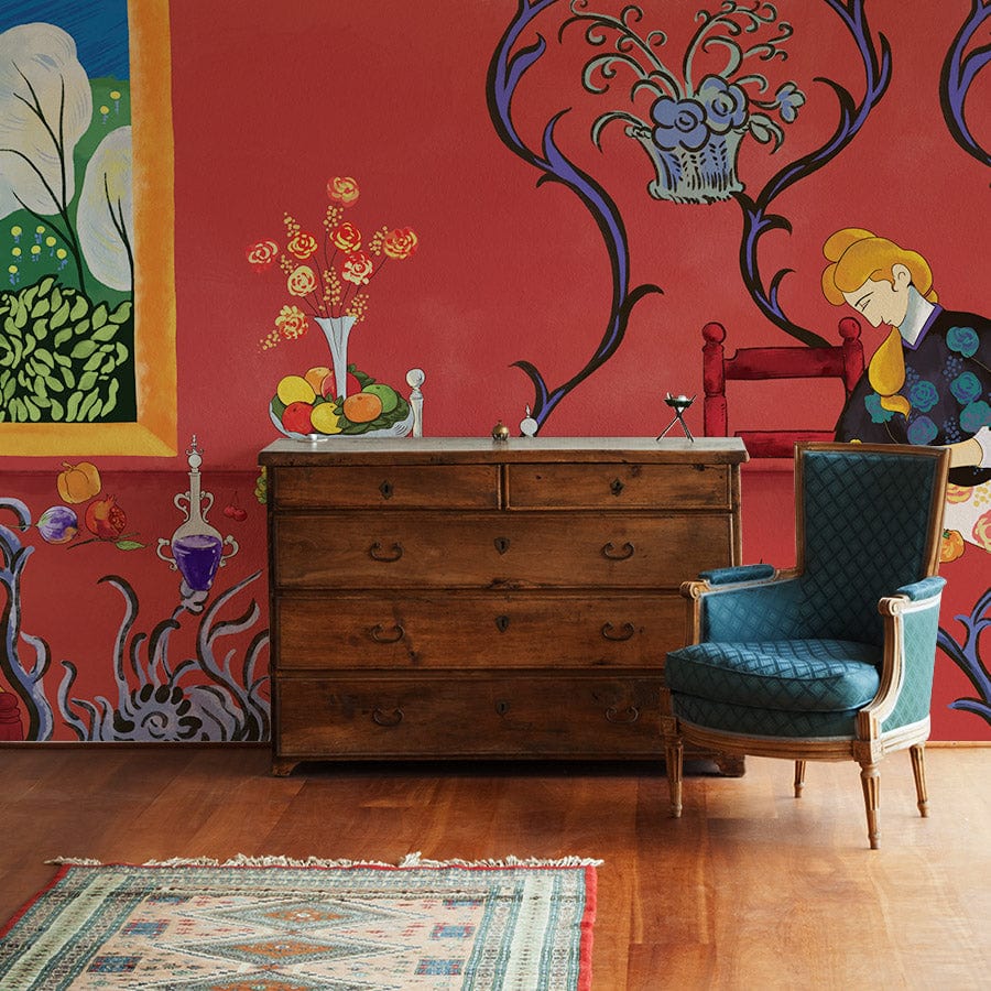 Rich Red Artistic Floral Mural Wallpaper with blue accents, wooden dresser, elegant armchair, hardwood flooring.