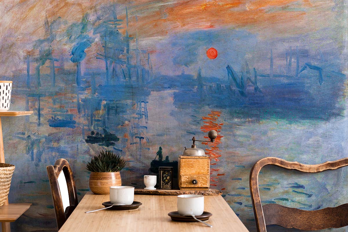 Impressionist Sunrise Wall Mural in a cosy dining room with wooden chairs and table set.