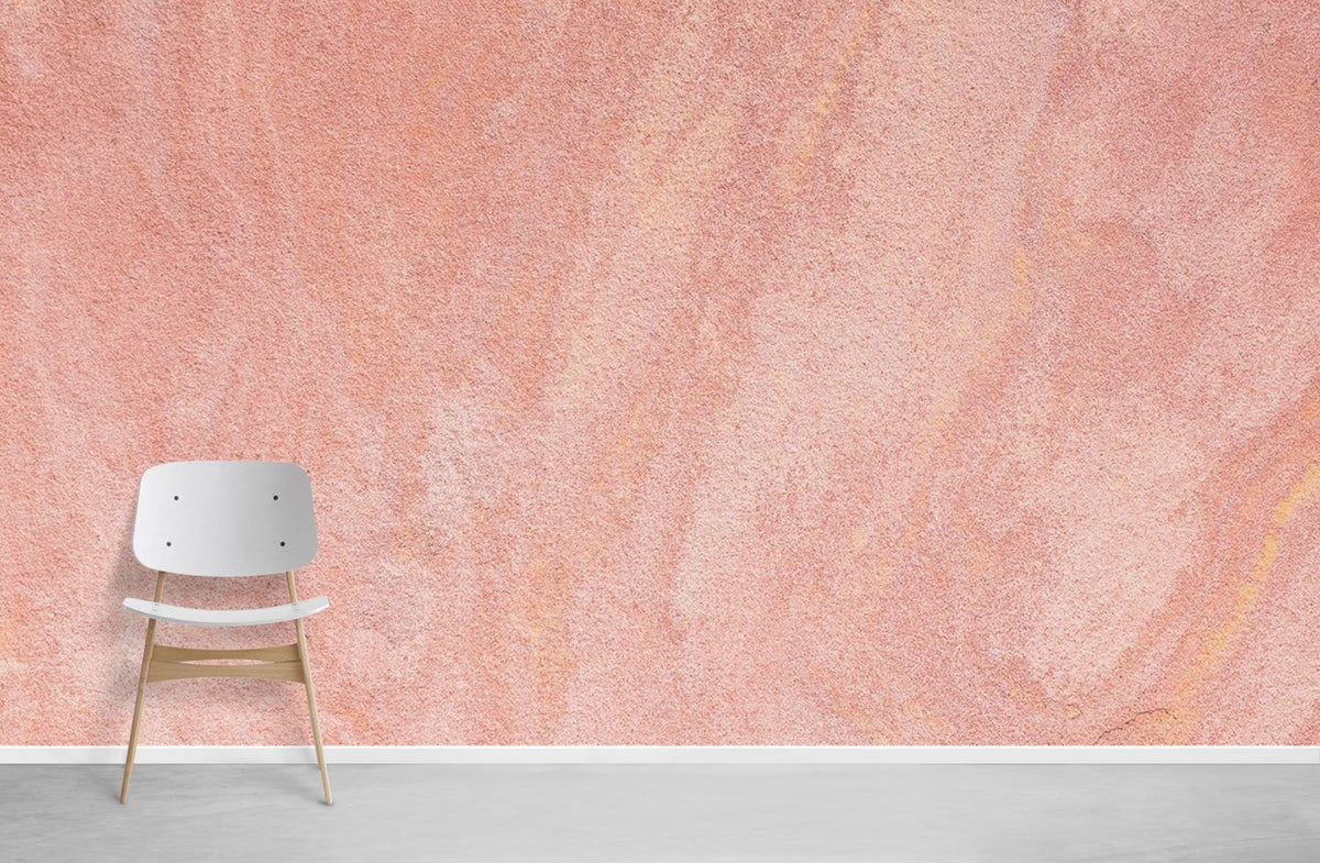 Elegant peach marble wallpaper with modern white chair on grey floor in minimalist room setting.
