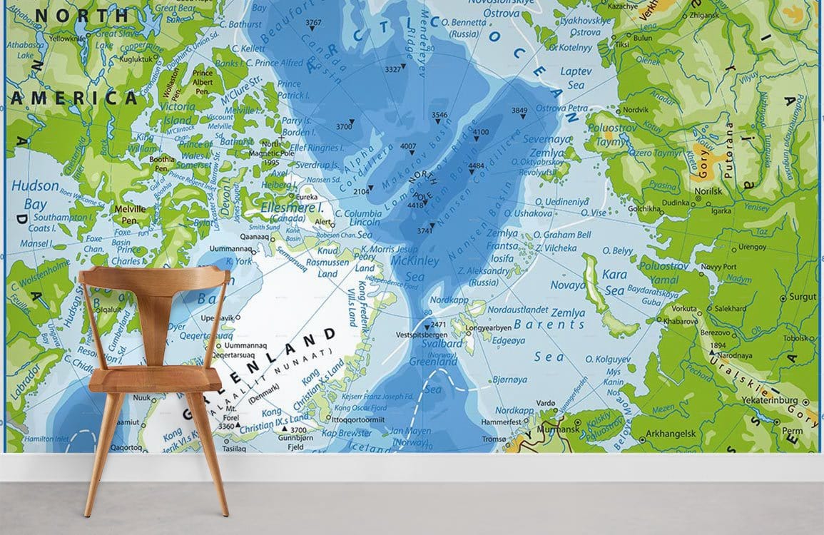 World Explorer's Vintage Map Mural Wallpaper, blue-green tones, wooden chair, white skirting, grey flooring.