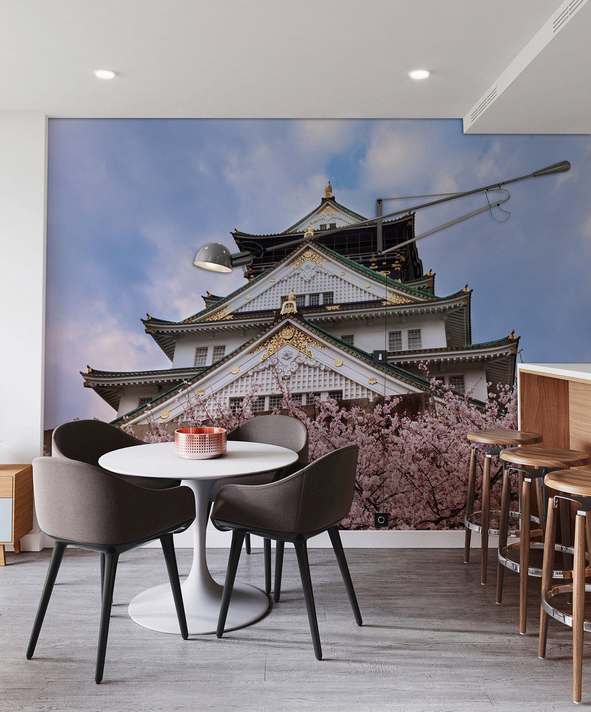 Japanese Cherry Blossom Castle Mural Wallpaper in modern dining room with grey chairs, wood flooring.