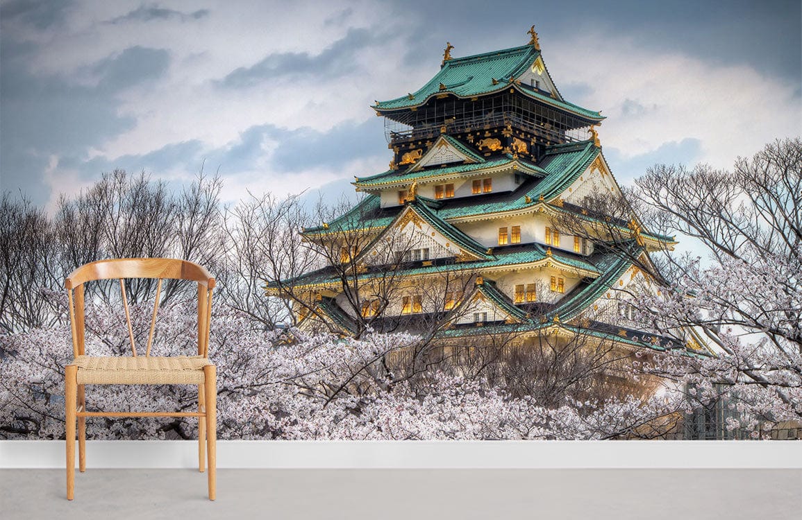 Serene Japanese Castle mural, cherry blossoms, wooden chair, grey flooring, wall art featuring scenic landscape.