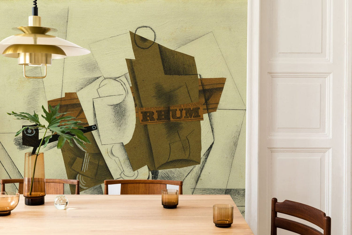 Cubist-inspired geometric wallpaper in modern dining room with wooden table, chairs, and pendant light.