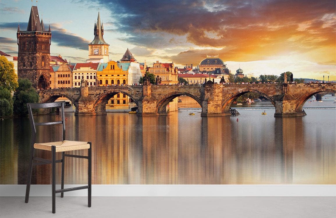 Elegant Prague cityscape mural wallpaper with historic bridge, featuring wooden chair, grey flooring, vibrant design.