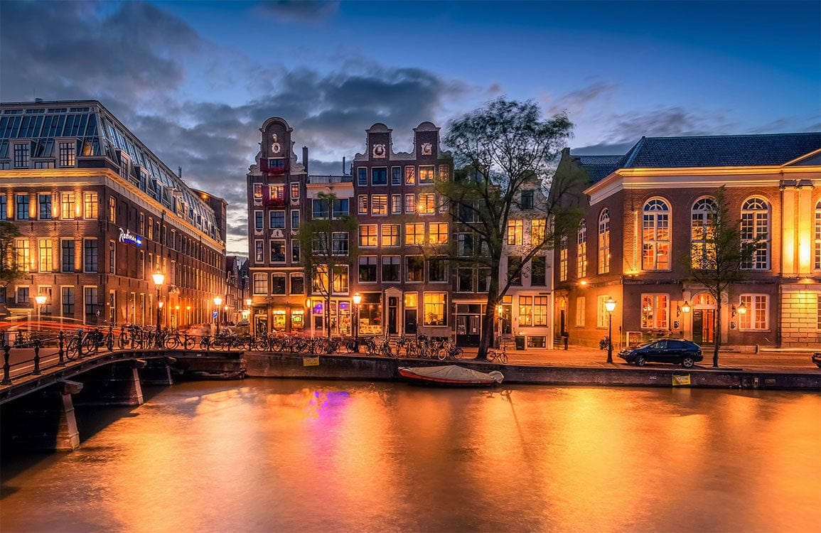 Enchanting Amsterdam Canal View Mural Wallpaper in Evening Glow