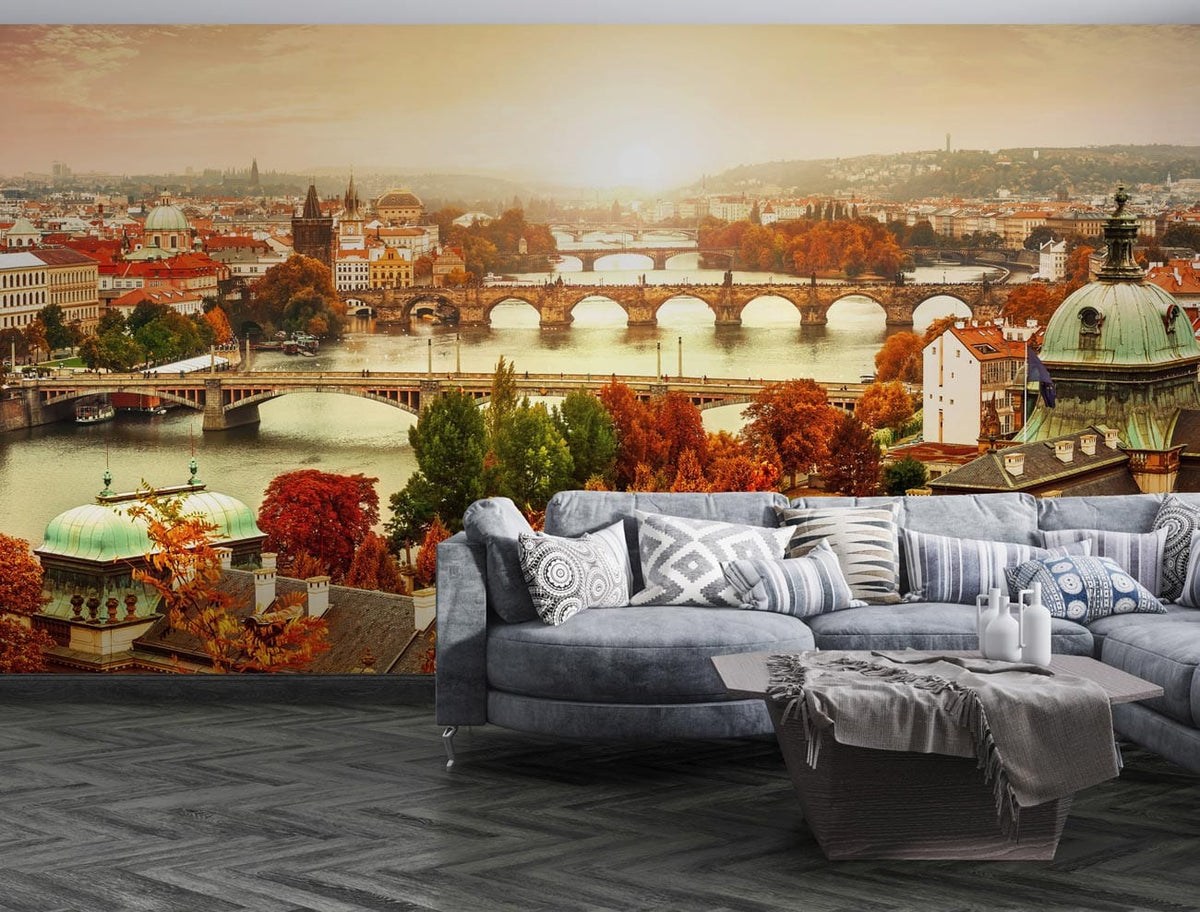 Autumn sunset Prague mural wallpaper with grey sectional sofa, chevron patterned flooring in stylish lounge.