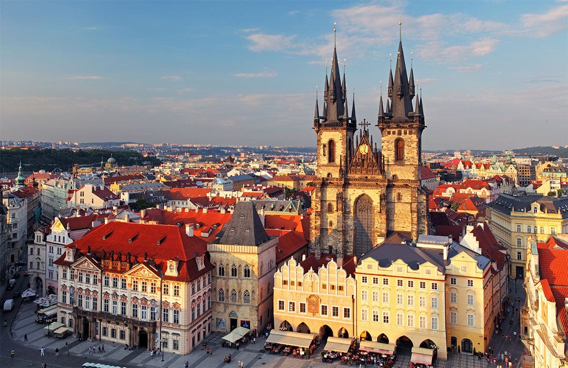 Charming Prague Skyline Mural Wallpaper - Vintage Architectural Elegance in Warm Hues