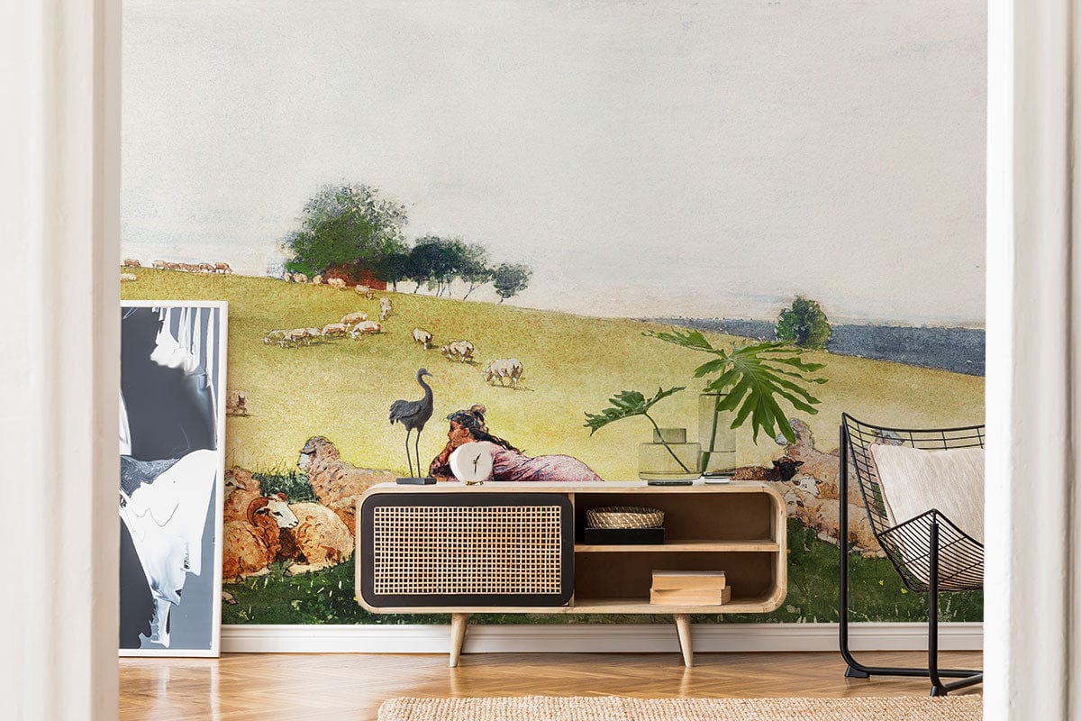 Pastoral Countryside Landscape Mural Wallpaper, serene green meadows, wooden sideboard, woven rug, light wood flooring.