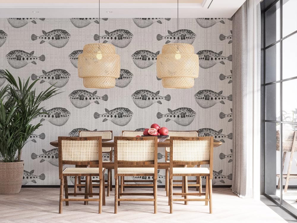 Tropical Grey Puffer Fish Patterned Wallpaper in dining room with wicker chairs and wooden table.