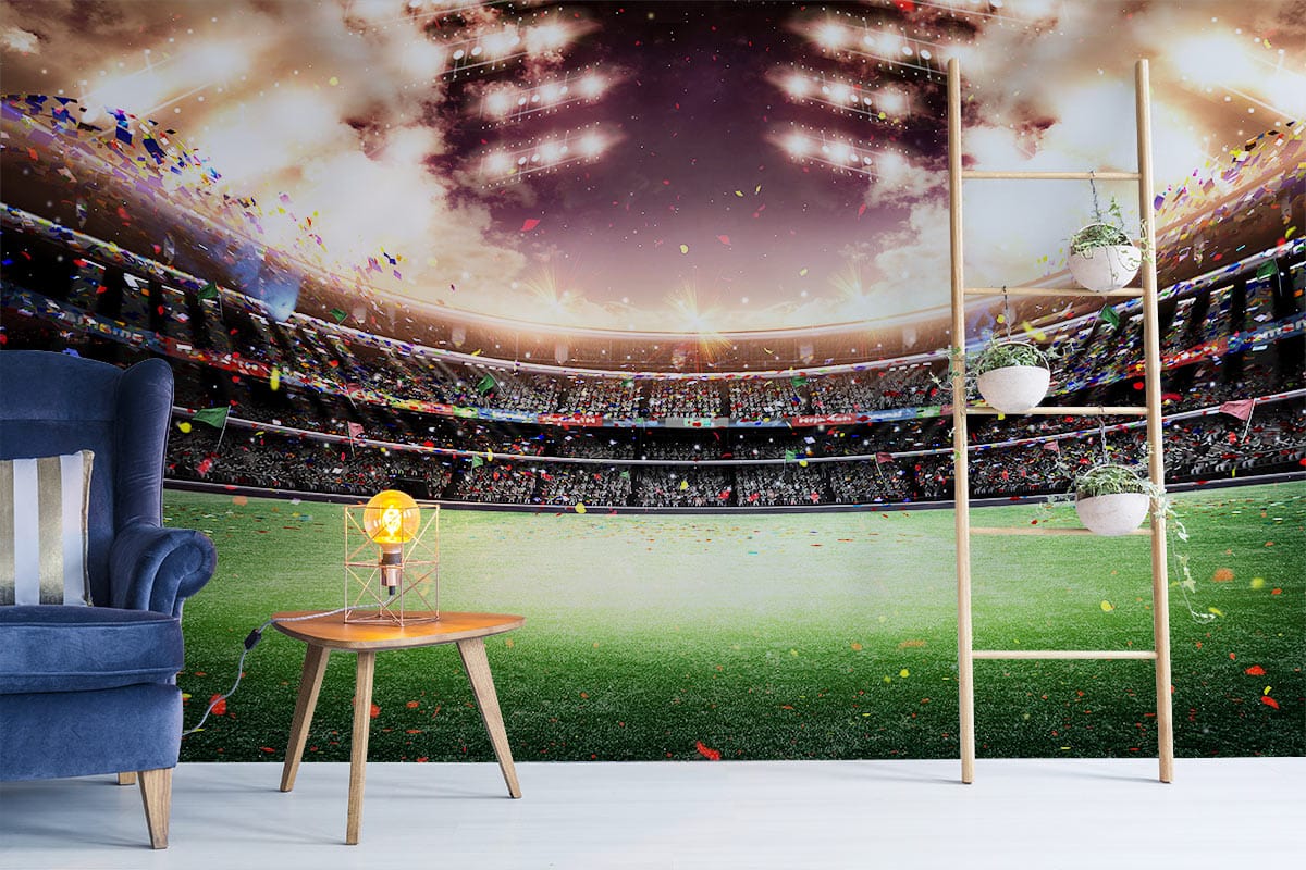 Vibrant stadium mural wallpaper, glowing lights, green field, blue armchair, wooden table, modern lounge.