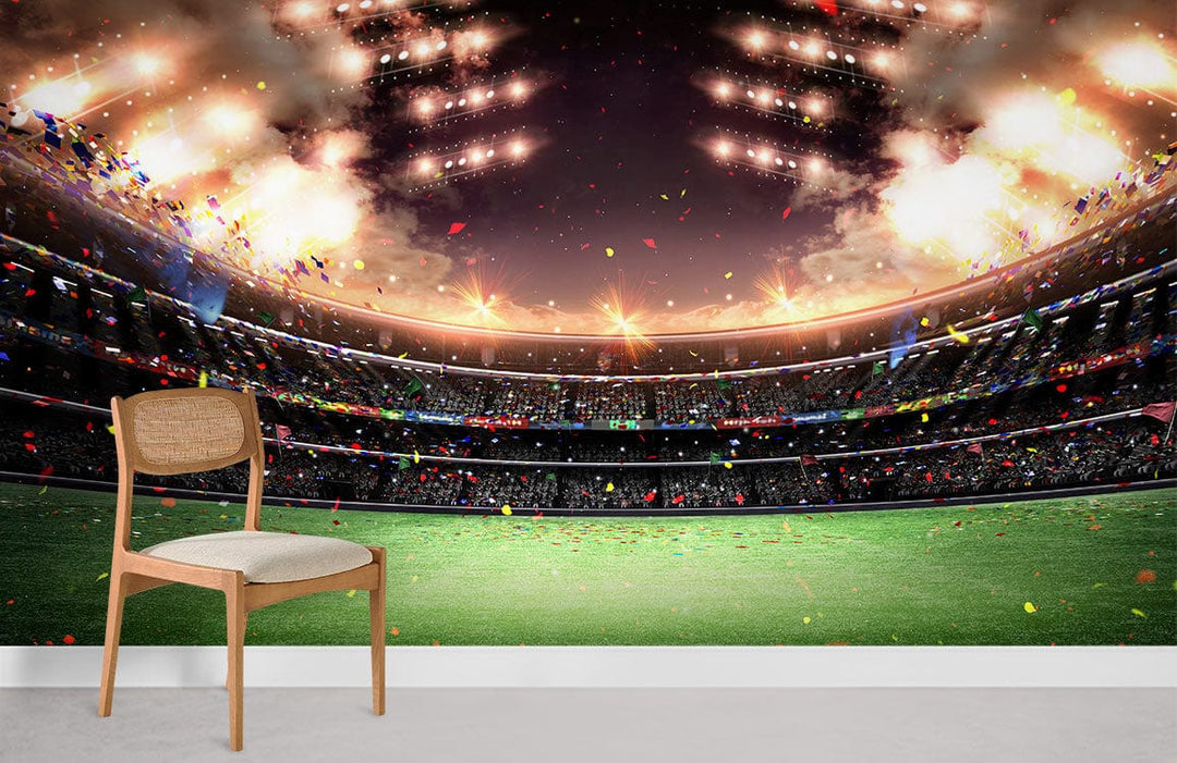 Stadium mural wallpaper with glowing lights, green field, wooden chair, modern room, vibrant decor.