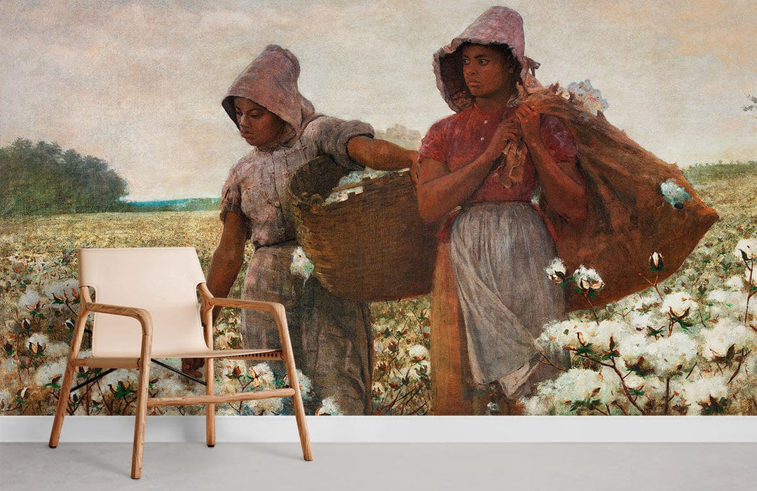A wooden chair on grey flooring in front of a vintage-style mural of farmers in a cotton field.
