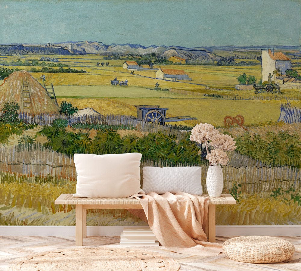 Idyllic countryside wallpaper mural, impressionist style. Bench, cushions, soft beige throw, rustic room decor.