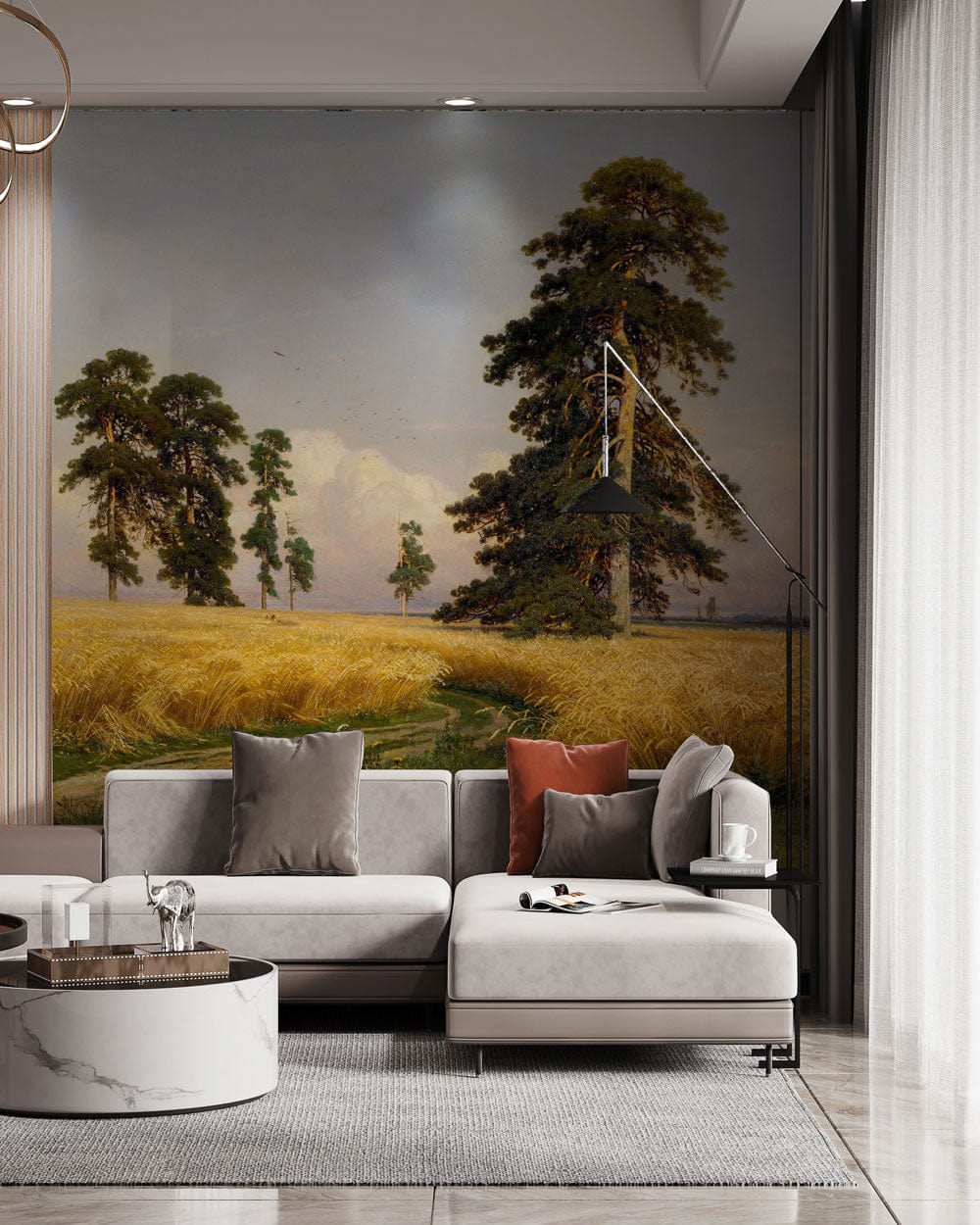 Tranquil Countryside Mural: Golden Fields, Verdant Pines, grey sofa, marble coffee table, chic living room.