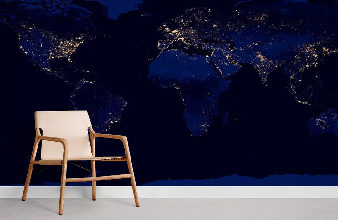 Night Sky Earth Map Mural Wallpaper with City Lights, beige chair, concrete flooring in living room.