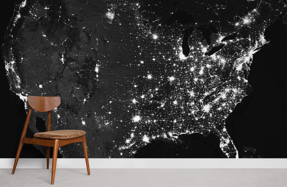 Starry Night Urban Lights Wallpaper Mural with wooden chair, white skirting board, grey flooring.