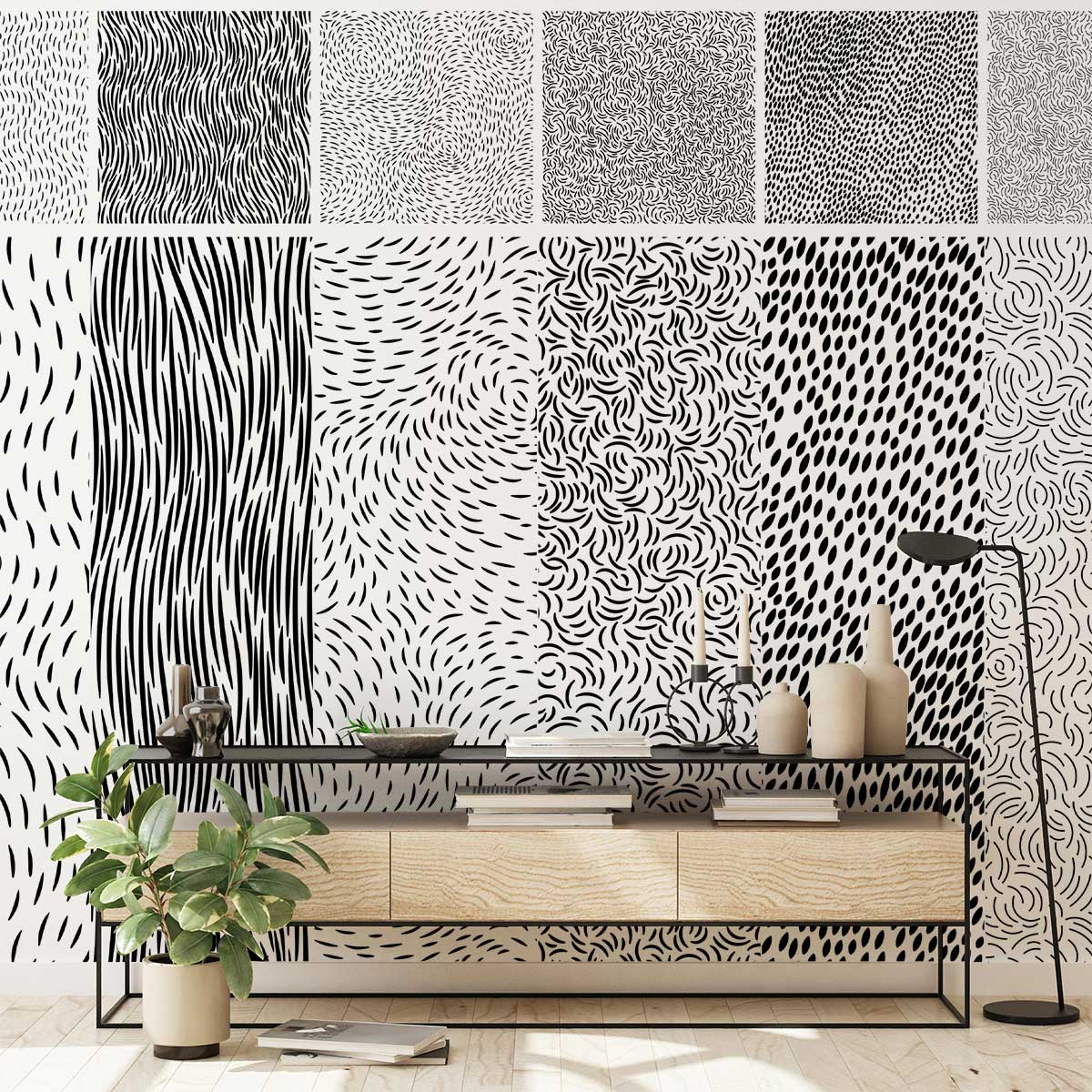 Monochrome abstract black and white wallpaper in modern living room with light wood console and lamp.
