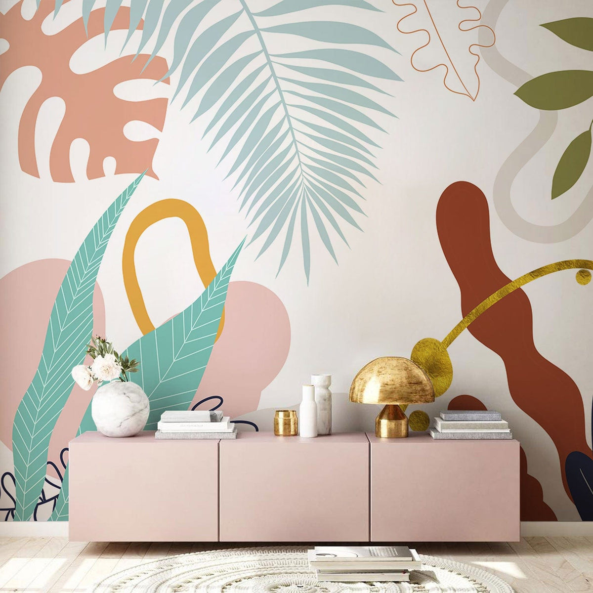 Colourful abstract botanical mural wallpaper, trendy leafy design, pink sideboard, neutral rug, stylish decor.