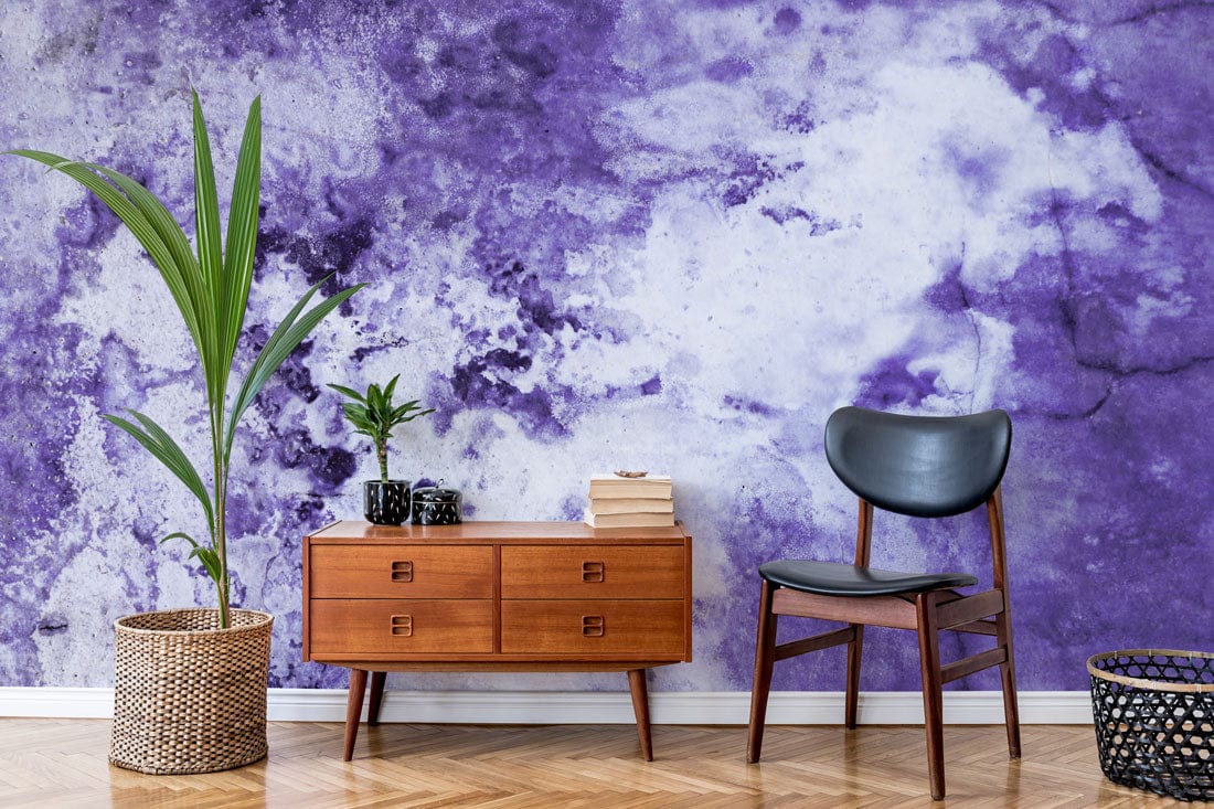 Majestic purple marble mural wallpaper in elegant interior with mid-century furniture on herringbone flooring.