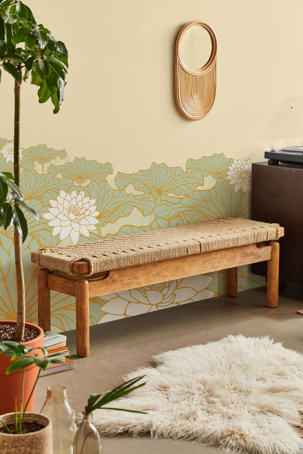 Elegant Gold and Green Lotus Blossom Mural; cosy interior with wooden bench, light rug, plant decor.