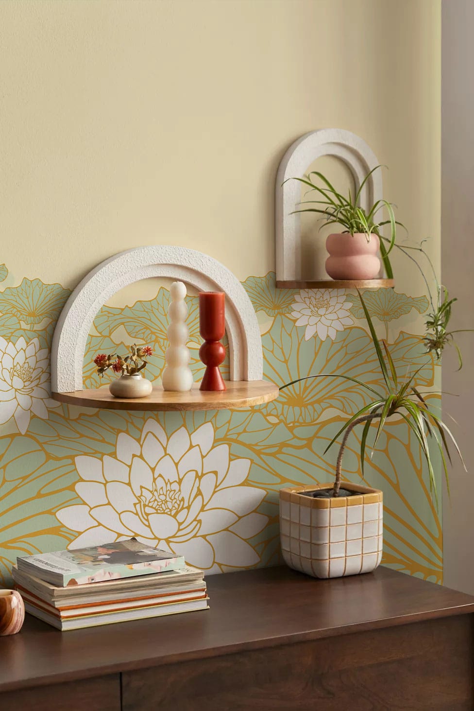 Elegant Gold and Green Lotus Blossom Mural Wallpaper in serene interior with wall shelves and decor.