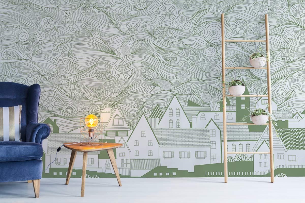 Vintage mural wallpaper with swirling sky. Features blue armchair, wooden ladder, modern minimalist table.