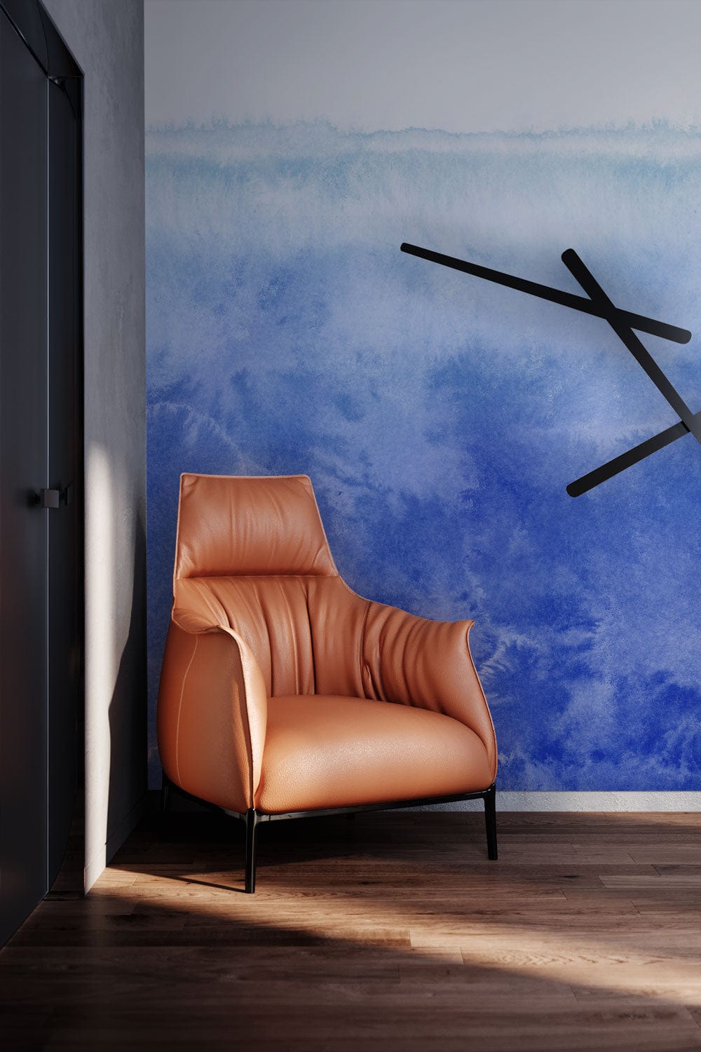 Oceanic Blue Watercolour Effect Mural Wallpaper with leather armchair, modern clock, wooden flooring.