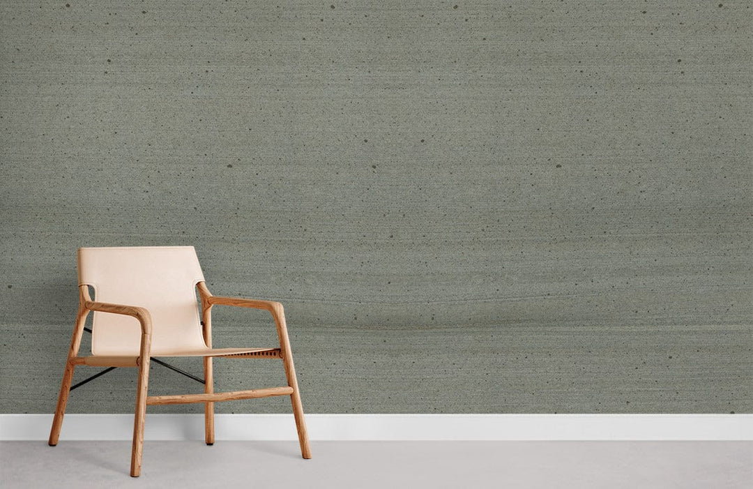 Moss Green Textured Minimalist Wallpaper in a contemporary living room with beige wood-frame chair.
