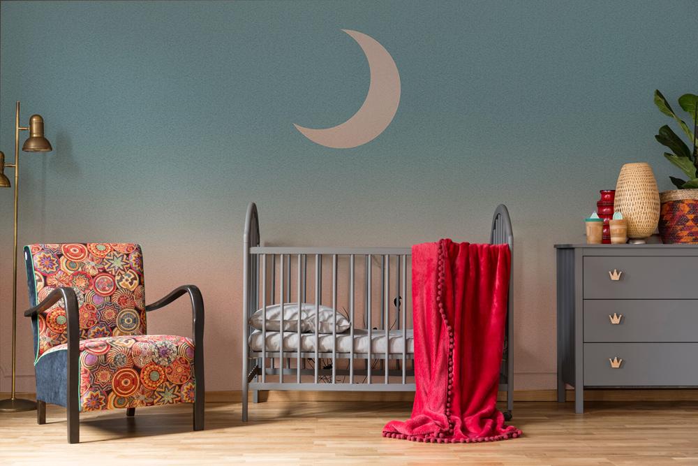Serene Pastel Sunset Sky Wallpaper; nursery with grey crib, colourful armchair, wooden flooring, crescent moon.