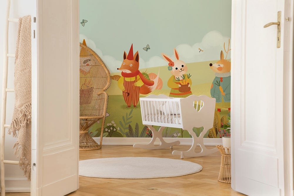 Whimsical Woodland Friends kids' mural wallpaper, pastel nursery, white cradle, wicker chair, wooden flooring.