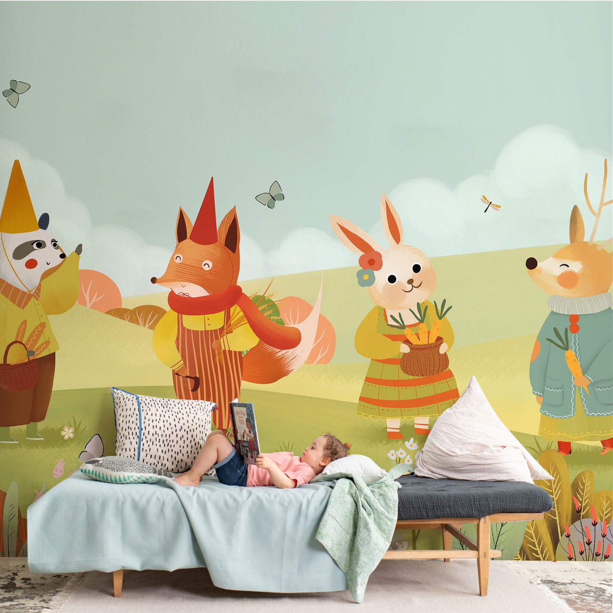 Whimsical Woodland Friends Mural Wallpaper in pastels, kids' room decor, soft blue sofa, cosy setup.