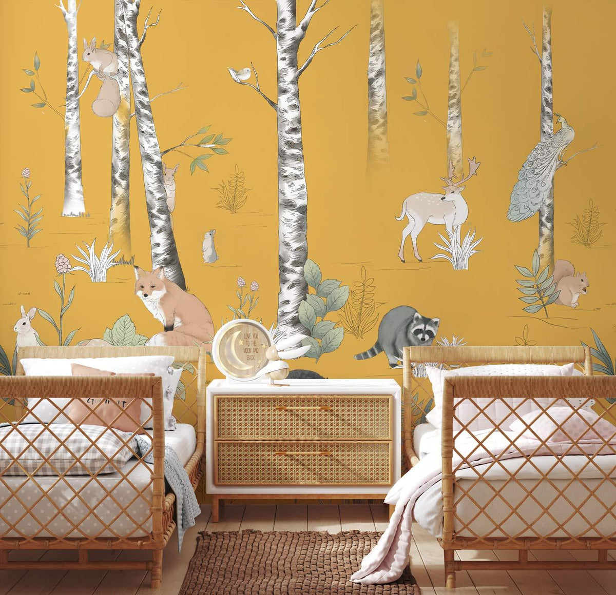 Golden Forest Friends: Woodland Animals Mural, nursery wallpaper, rattan furniture, wooden floor, serene atmosphere.