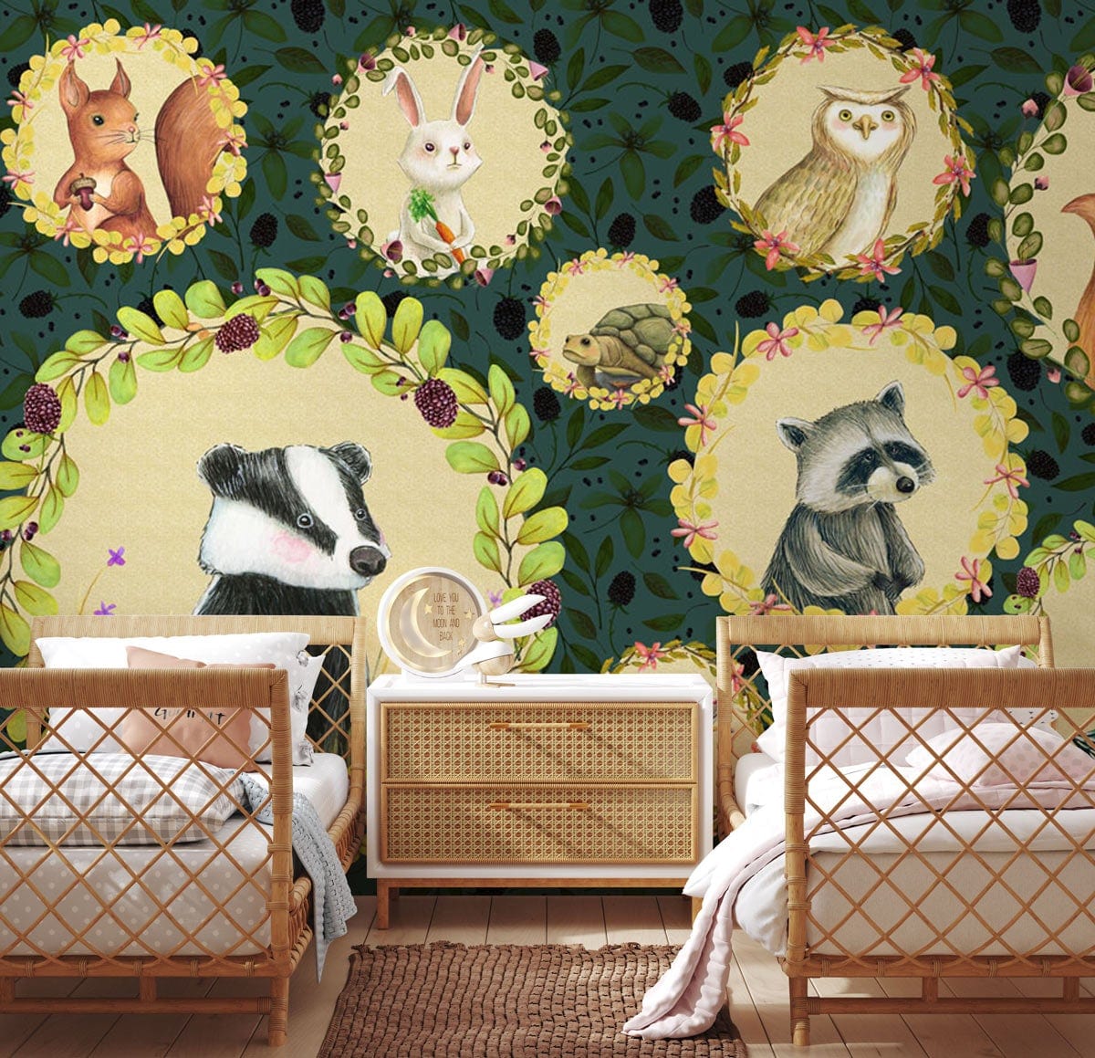 Whimsical Woodland Creatures mural wallpaper in green rustic children's bedroom with wicker beds, wooden floor.