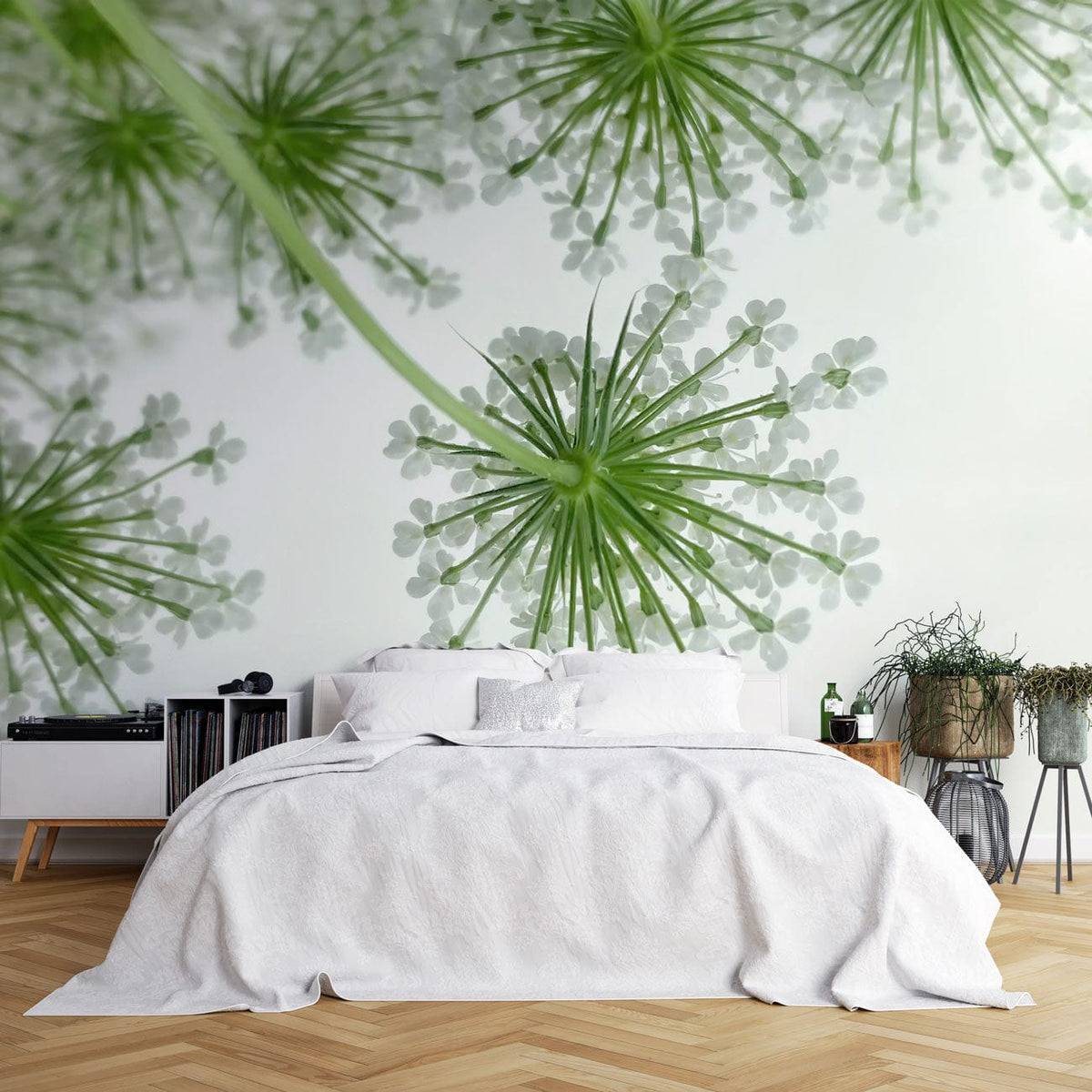 Serene Green Floral Burst Wallpaper in bedroom with white bed, wooden flooring, and modern decor accents.