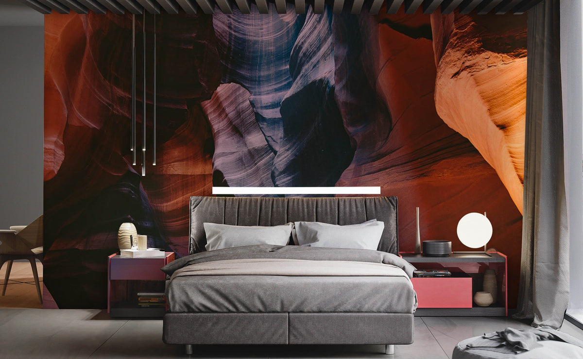 Rustic Canyon Serenity mural wallpaper in earthy colours, modern grey bed, minimalist bedroom decor, wooden flooring.