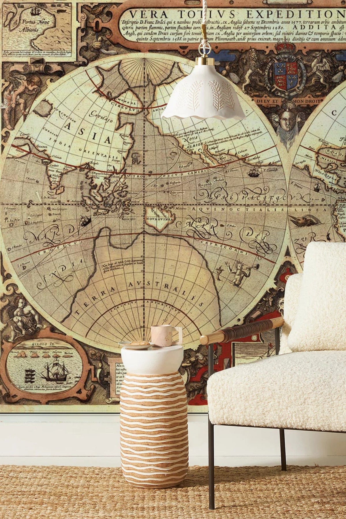 Vintage world map mural, antique style, earth-tone wallpaper, beige textured sofa, woven rug, modern decor.